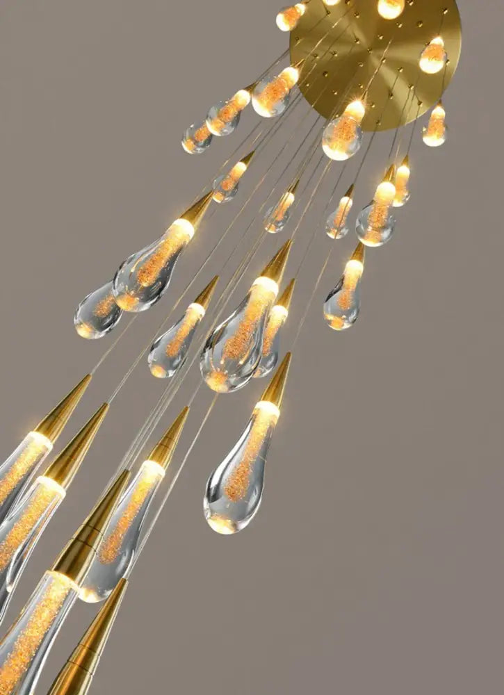 Gold Teardrop Chandelier with glass droplets and gold accents by Decorbites on Tampa Home & Garden Store
