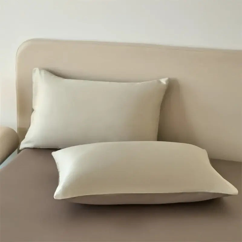Beige duvet cover set in lyocell silk by Decorbites, luxe bedroom bedding with two pillows on Tampa Home & Garden Store