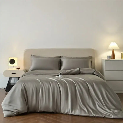 Duvet cover set by Decorbites in beige lyocell silk on a neatly made bed on Tampa Home & Garden Store