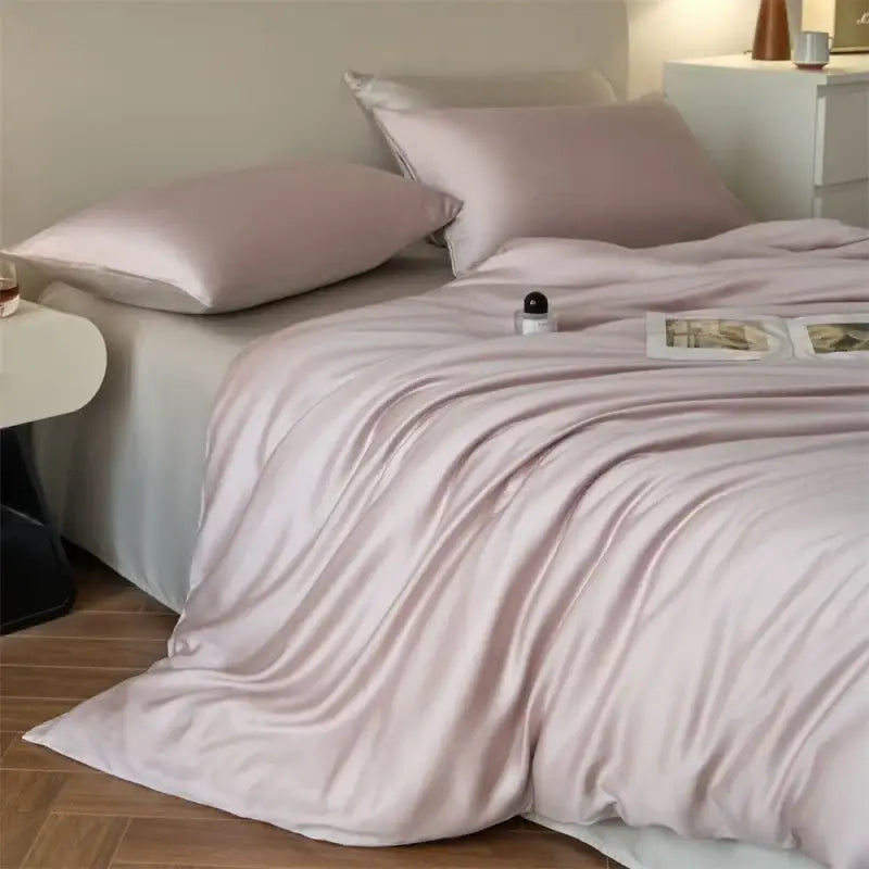 Duvet cover set by Decorbites, beige lyocell-silk on bed on Tampa Home & Garden Store