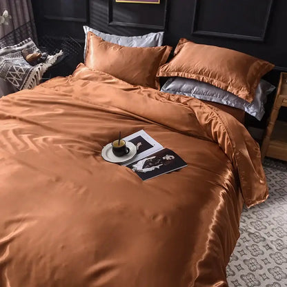 Luxurious blush pink silk duvet cover set by Decorbites with matching pillowcases on Tampa Home & Garden Store