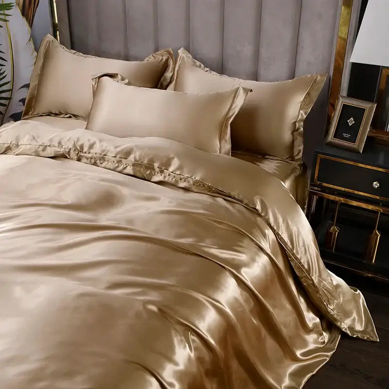 Silk duvet cover set in blush pink by Decorbites with matching pillow shams on bed on Tampa Home & Garden Store