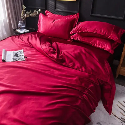 Luxurious Decorbites blush pink silk duvet cover set on bed with matching pillow shams on Tampa Home & Garden Store