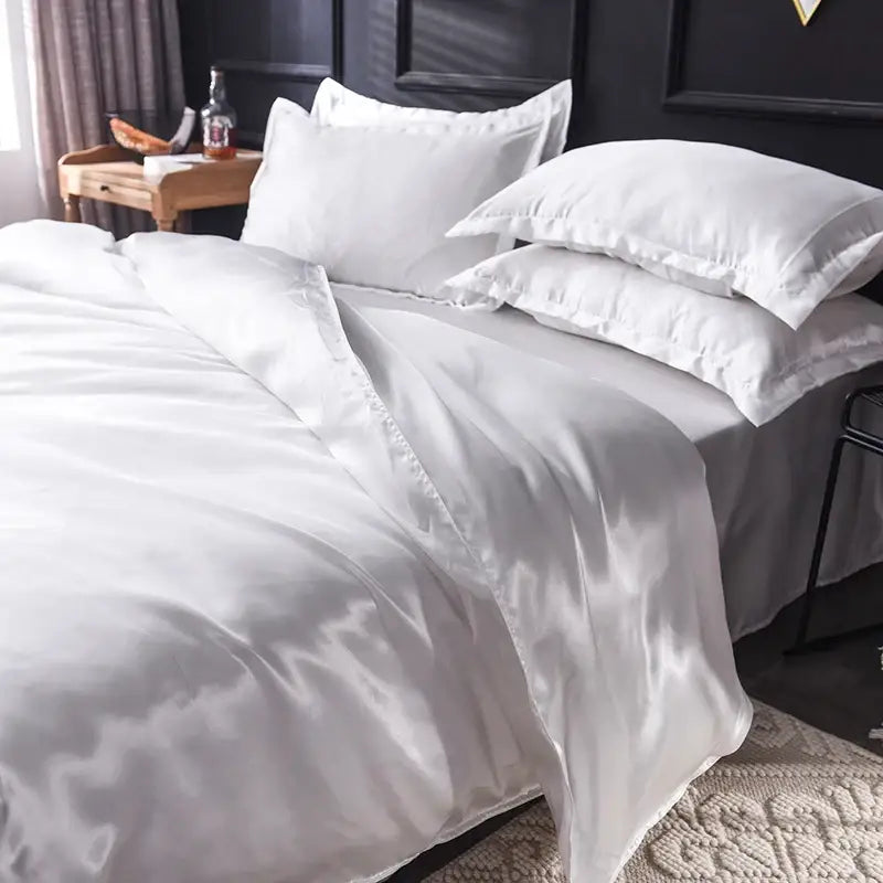 Silk duvet cover set blush pink by Decorbites for bedroom on bed with white pillows on Tampa Home & Garden Store