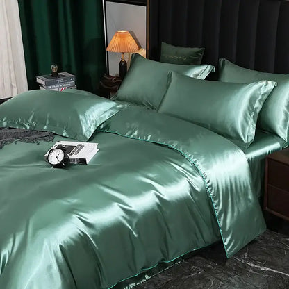 Satin duvet covers by Decorbites emerald green bedding set on bed with multiple pillows on Tampa Home & Garden Store