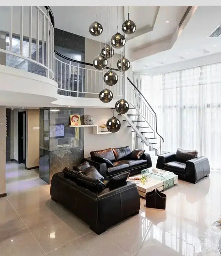 Decorbites loft chandelier dark amber glass spiral pendant with bulbs over living room on Tampa Home & Garden Store