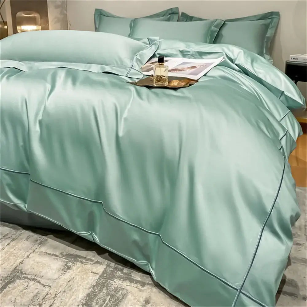 Duvet cover bedding set by Decorbites in teal egyptian cotton on a bed with matching pillows on Tampa Home & Garden Store