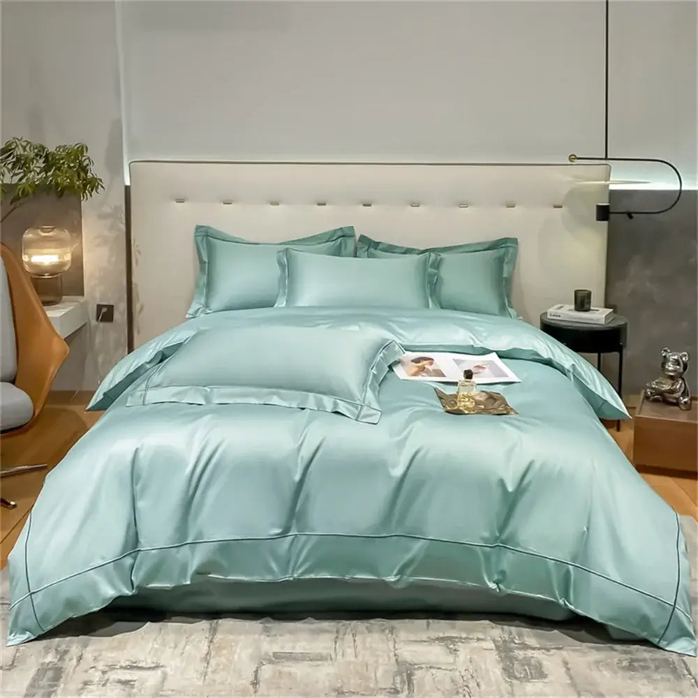 Teal egyptian cotton duvet cover bedding set with matching pillows on a bed on Tampa Home & Garden Store