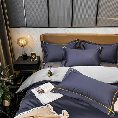 Decorbites navy and gold Egyptian cotton duvet cover bedding set with gold piping on bed on Tampa Home & Garden Store