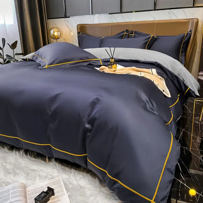 Decorbites navy and gold Egyptian cotton duvet cover set with gold piping and navy shams on Tampa Home & Garden Store
