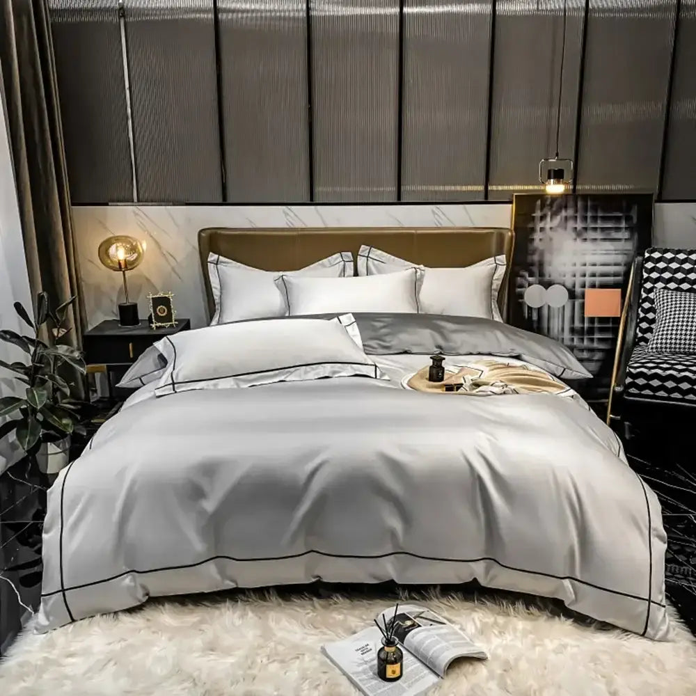 Duvet cover set by Decorbites in navy and gold egyptian cotton on a modern bed on Tampa Home & Garden Store