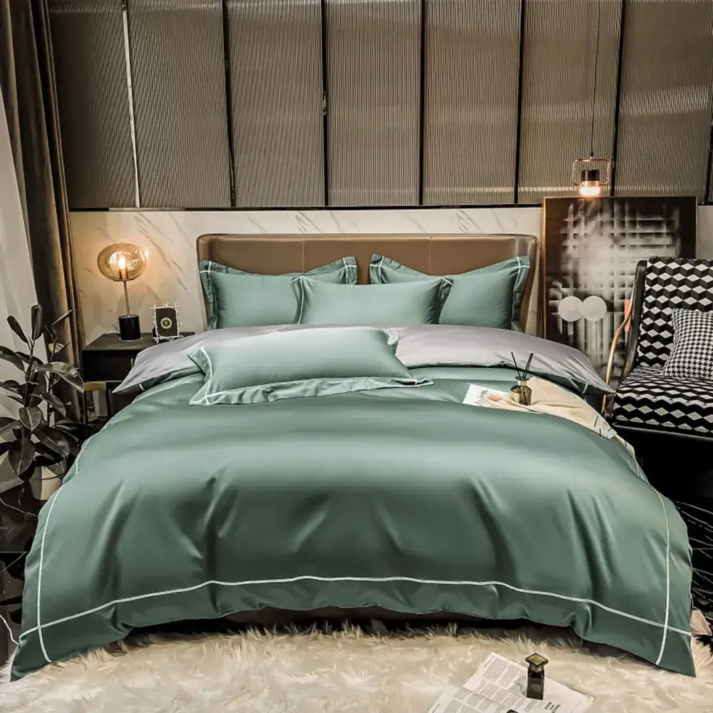Decorbites navy egyptian cotton duvet cover set on teal bed with teal pillows in a luxe bedroom on Tampa Home & Garden Store