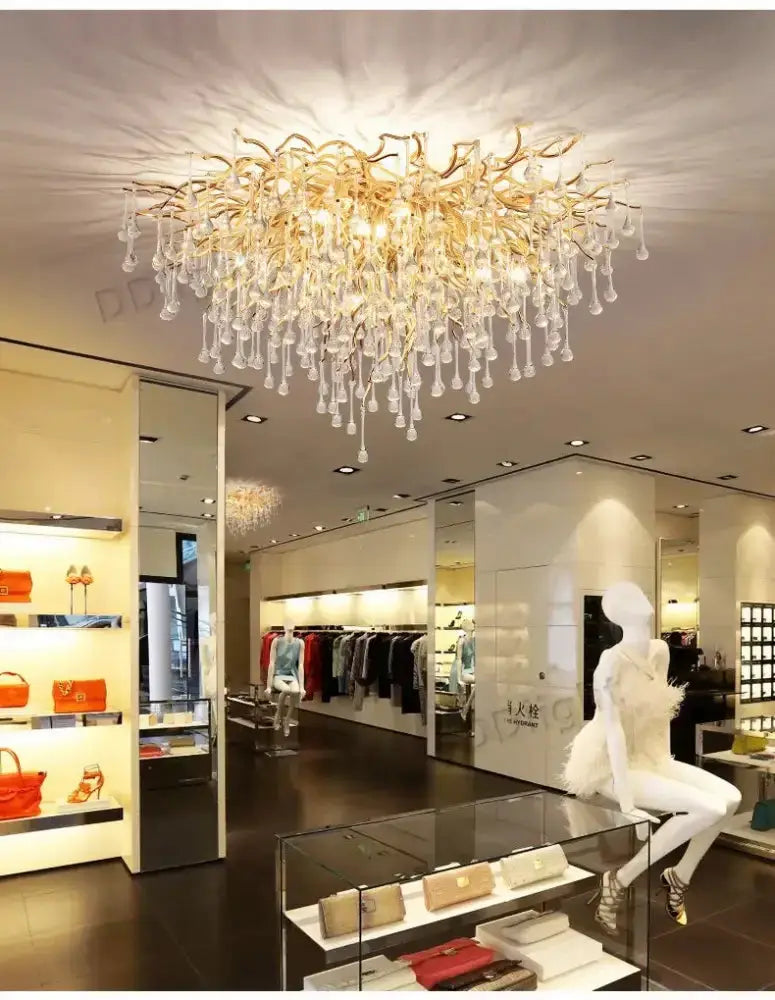 Chandelier Decorbites luxury gold branch crystal pendant light in showroom on Tampa Home & Garden Store