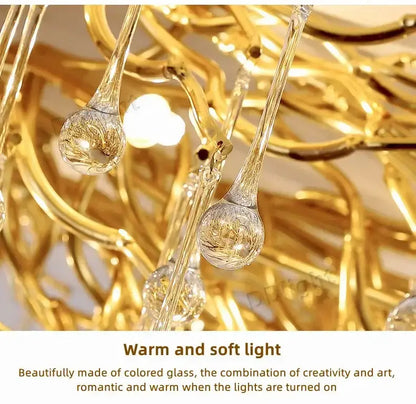 Chandelier Decorbites luxury gold crystal pendant light with teardrop prisms, warm glow on Tampa Home & Garden Store