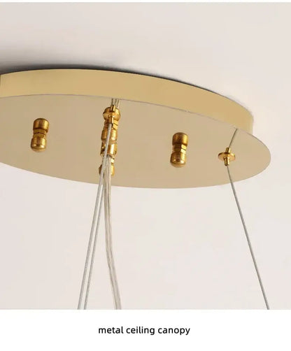 Decorbites chandelier metal ceiling canopy with gold mounting hardware and hanging cables on Tampa Home & Garden Store