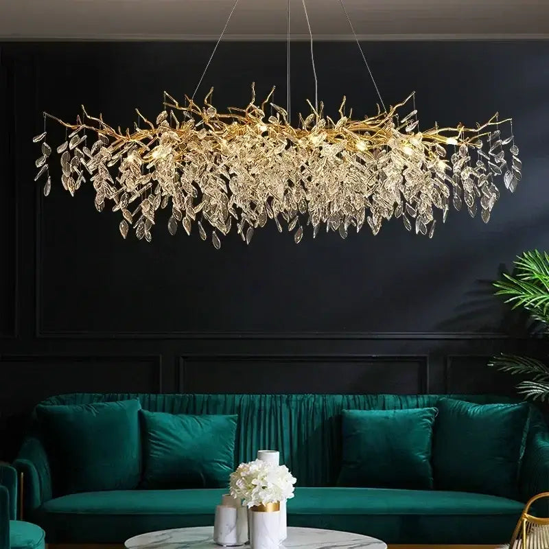 Luxury golden leaf crystal chandelier Decorbites LED over teal living room sofa on Tampa Home & Garden Store