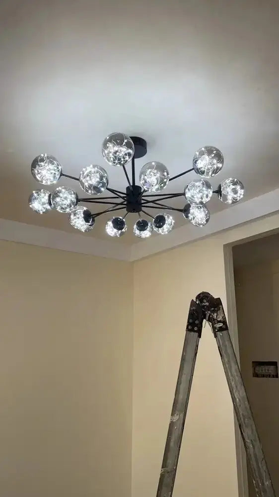 Decorbites modern black glass ball chandelier with clear globes, Sputnik-style arms on Tampa Home & Garden Store