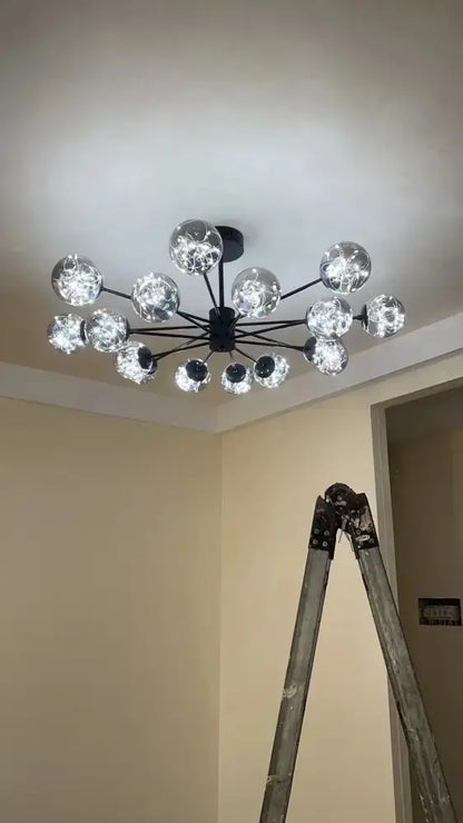 Decorbites modern black glass ball chandelier with clear globes, Sputnik-style arms on Tampa Home & Garden Store