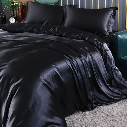 Champagne satin duvet cover set by Decorbites on bed with glossy black satin sheets on Tampa Home & Garden Store