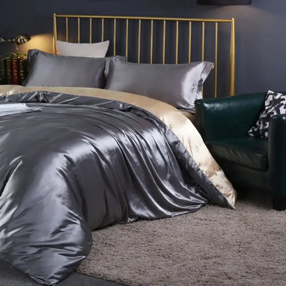 Champagne satin duvet cover set by Decorbites on bed with gold headboard on Tampa Home & Garden Store