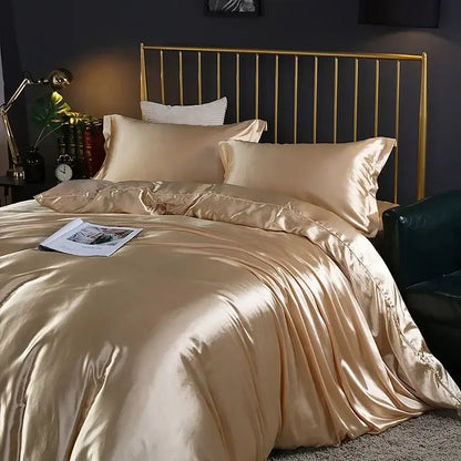 Pink-silver satin bedding set by Decorbites with pillow shams on a gold metal bed frame on Tampa Home & Garden Store