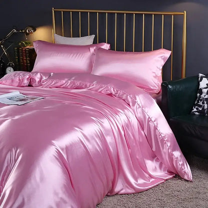 Pink Silver Satin Bedding set by Decorbites with pink pillow shams on a gold metal bed on Tampa Home & Garden Store