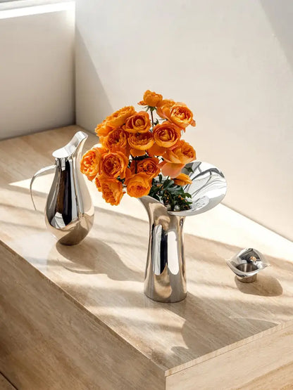 Silver stainless steel vase with orange rose bouquet Decorbites on Tampa Home & Garden Store