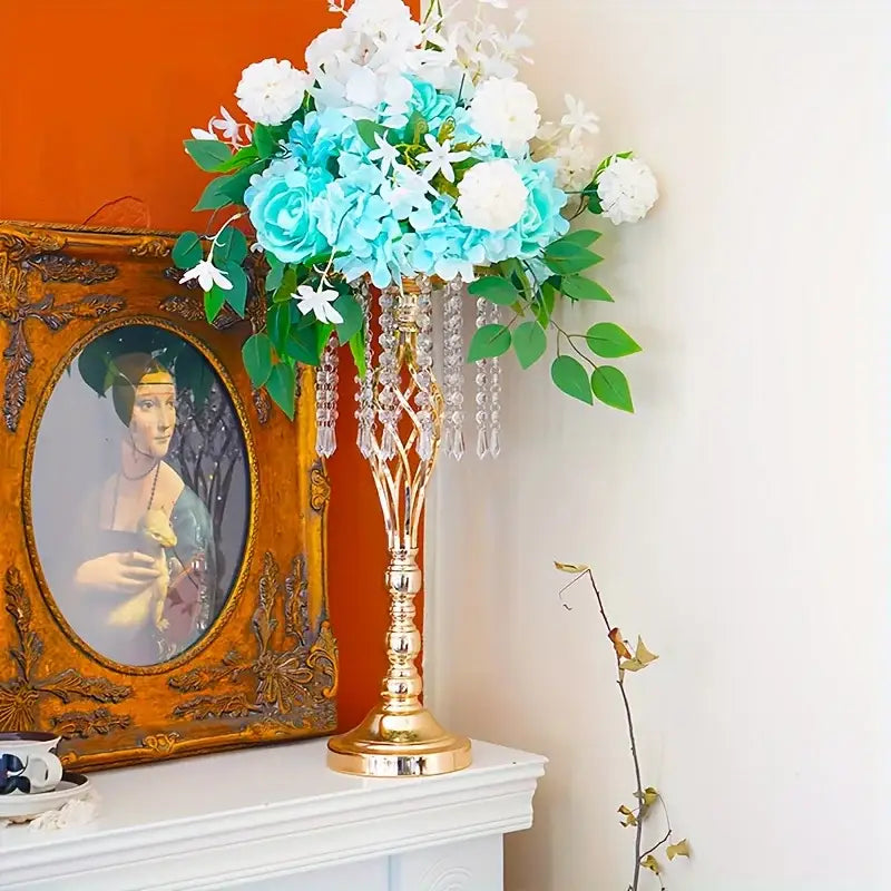 Gold crystal metal vase by Decorbites with crystal garlands holding turquoise blooms on mantel on Tampa Home & Garden Store