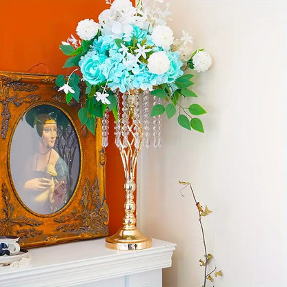 Gold crystal metal vase by Decorbites with crystal garlands holding turquoise blooms on mantel on Tampa Home & Garden Store