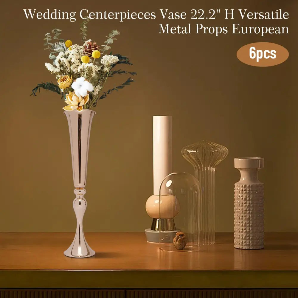 Gold metal vase stand with tall slender vase and dried flower bouquet on wood surface on Tampa Home & Garden Store