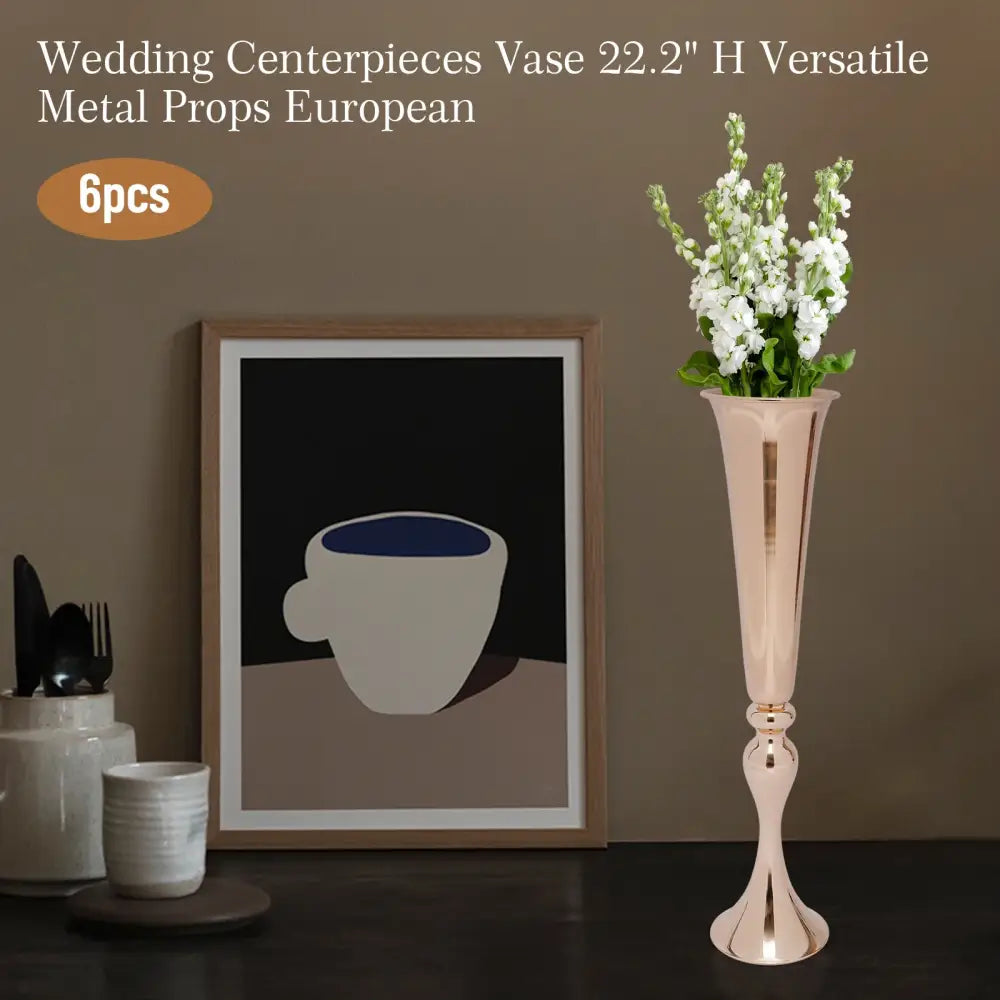 Gold metal vase stand by Decorbites, tall rose-gold pedestal with white flower arrangement on Tampa Home & Garden Store
