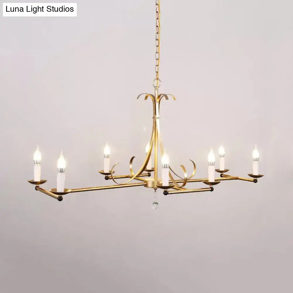 Antique brass candle chandelier by Decorbites with curved arms and gold metal finish on Tampa Home & Garden Store