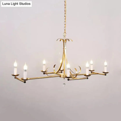 Antique brass candle chandelier by Decorbites with curved arms and gold metal finish on Tampa Home & Garden Store