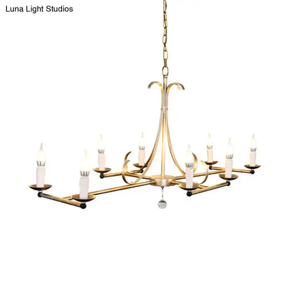 Antique brass candle chandelier with eight candle holders and crystal drop on Tampa Home & Garden Store