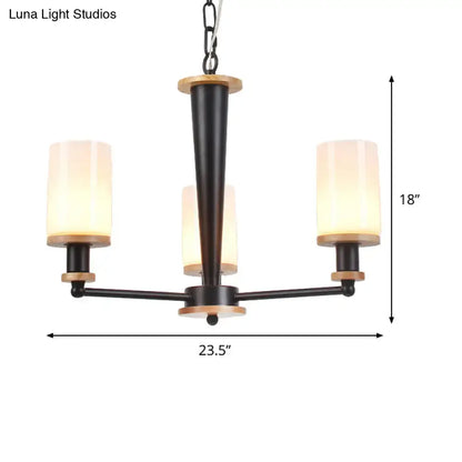 Black wood glass chandelier by Decorbites with frosted shades on black metal arms on Tampa Home & Garden Store