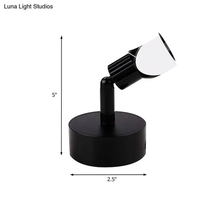 Black White Wall Lamp by Decorbites with a round black base and adjustable arm featuring a white shade on Tampa Home & Garden Store