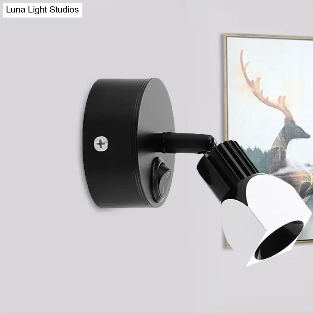 Black metal wall lamp with adjustable arm and white shade on Tampa Home & Garden Store