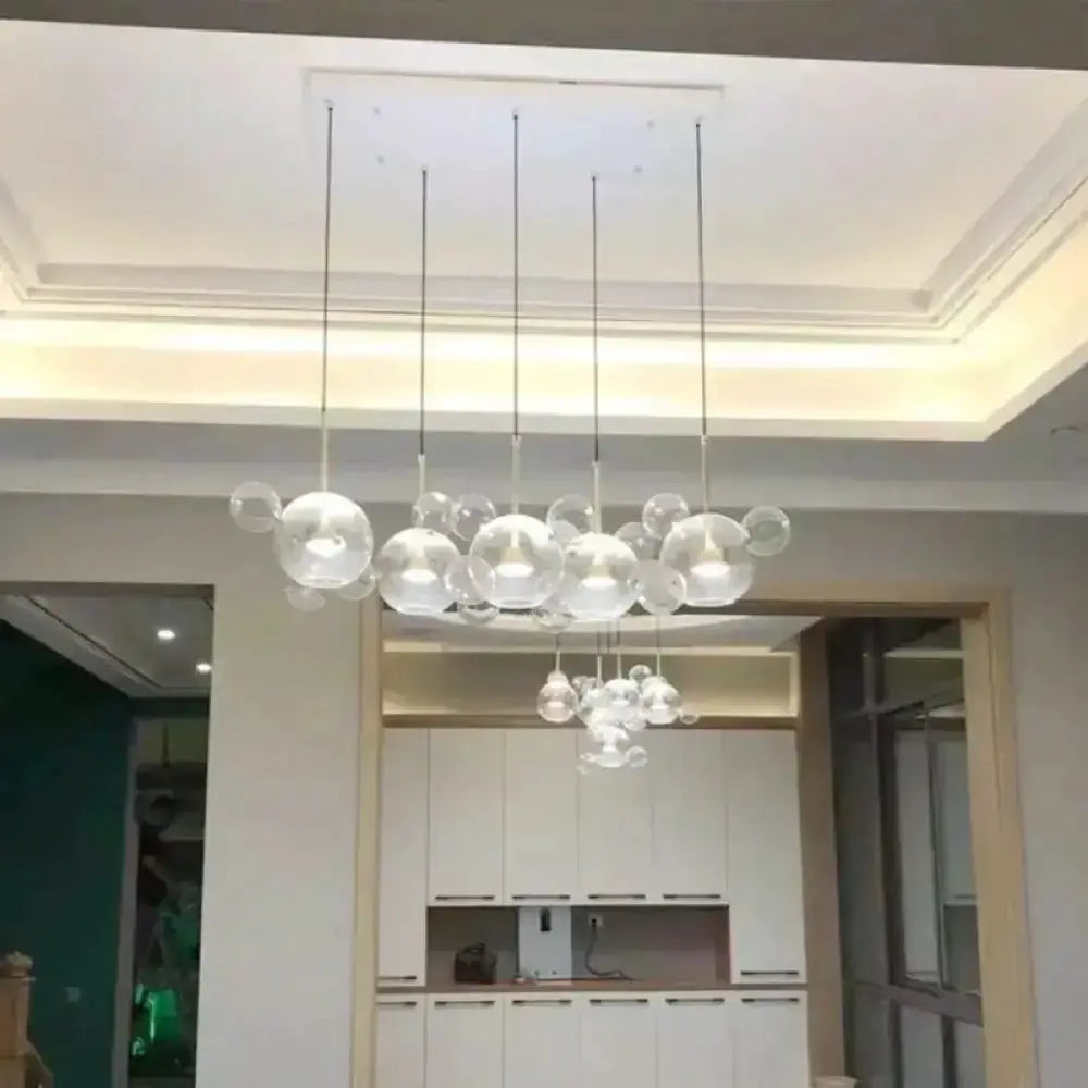 Modern brass bubble cluster pendant light by Decorbites, clear glass spheres for dining room on Tampa Home & Garden Store