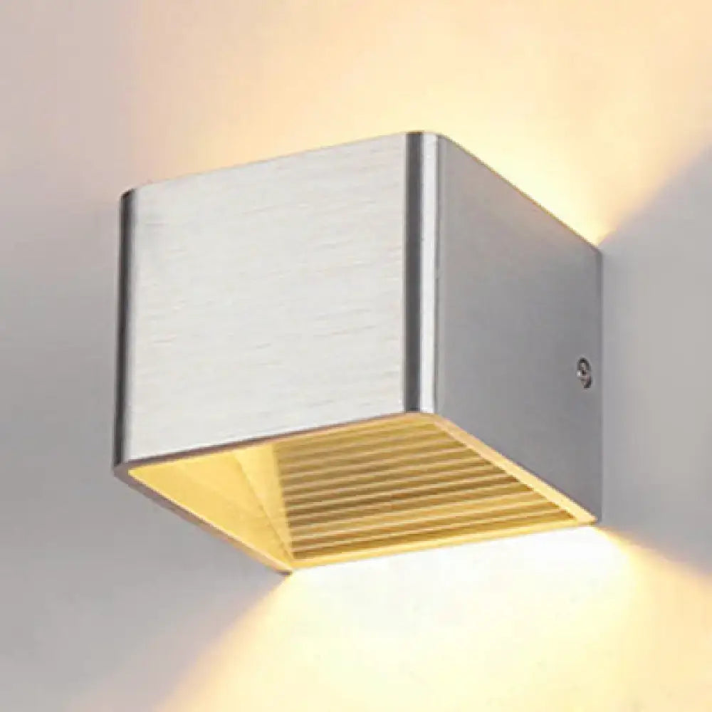 Black Cube Wall Sconce by Decorbites, brushed metal cube wall light with warm upward/downward glow on Tampa Home & Garden Store