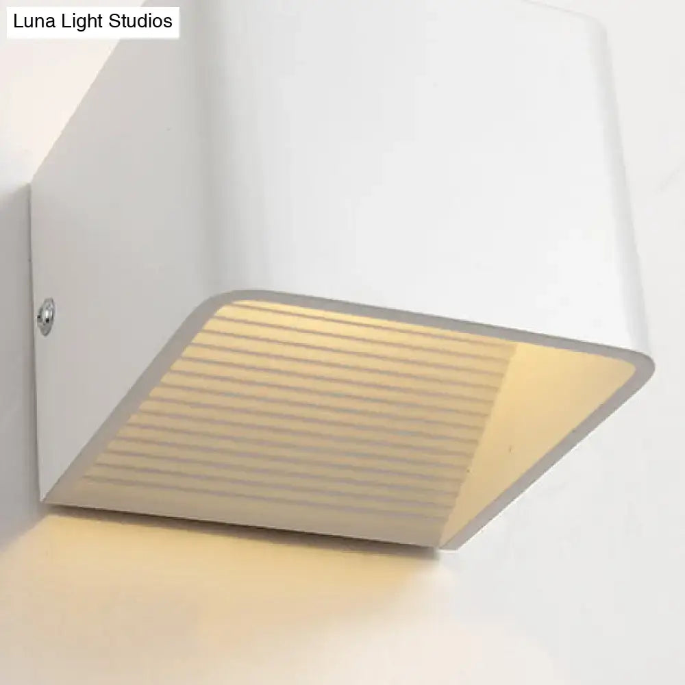 Black Cube Wall Sconce by Decorbites, modern metal wall light with angled ribbed front on Tampa Home & Garden Store