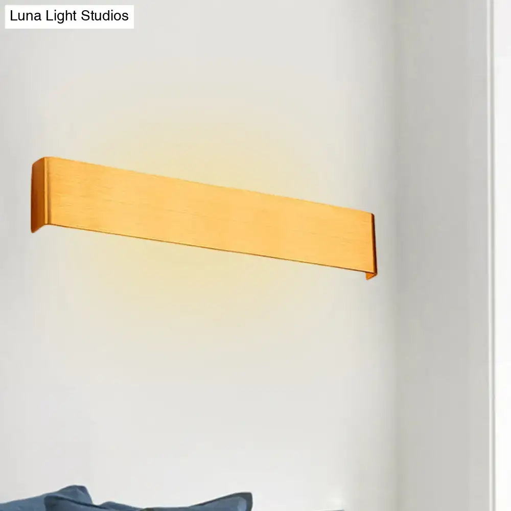 Wooden wall lamp featuring a long rectangular bar with warm light on white wall on Tampa Home & Garden Store