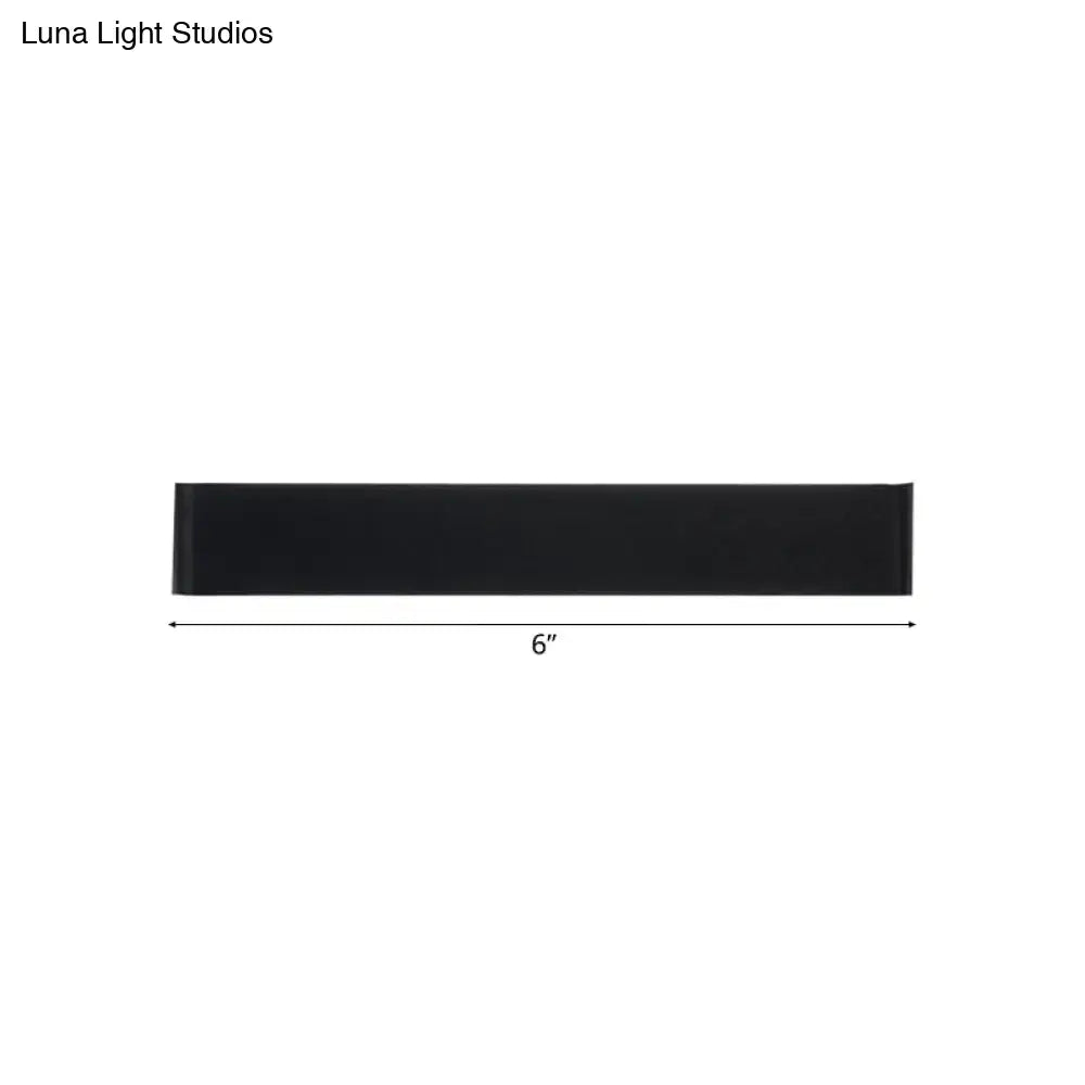 Black metal wall lamp with slim 6-inch bar design for modern decor on Tampa Home & Garden Store