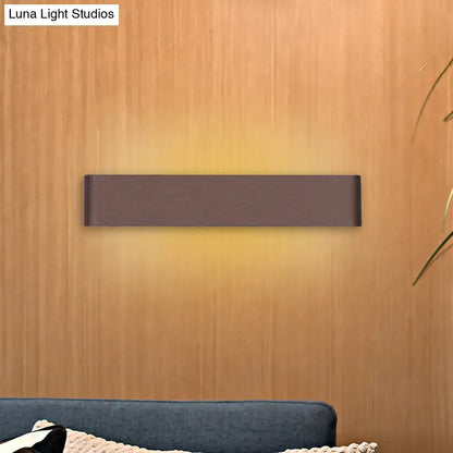 Black Silver Wall Lamp sconce with rectangular metal bar and warm ambient glow on Tampa Home & Garden Store