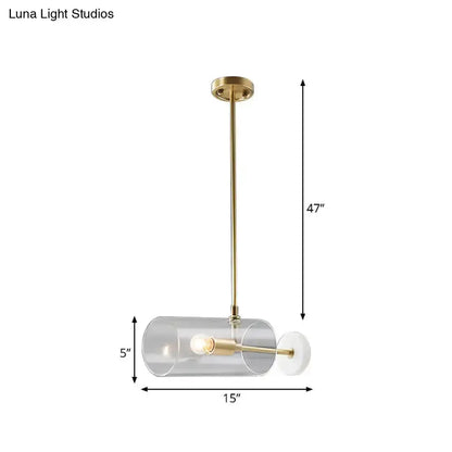 Modern brass pendant light with clear glass cylinder shade by Decorbites, 15in long on Tampa Home & Garden Store