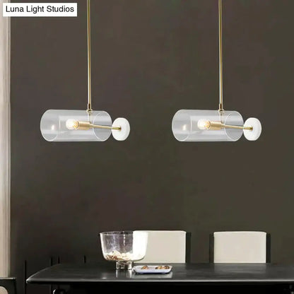 Modern brass pendant light with clear glass shade, dining table pair by Decorbites on Tampa Home & Garden Store