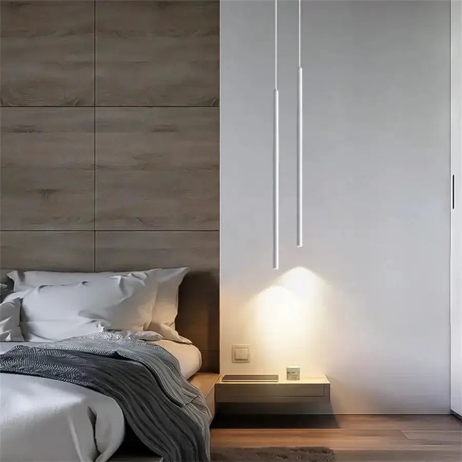 Decorbites white LED pendant lights, two hanging above a nightstand in a modern bedroom on Tampa Home & Garden Store