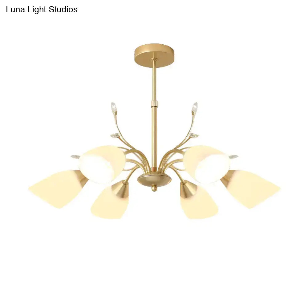 Gold glass chandelier with curved gold arms and frosted glass shades on Tampa Home & Garden Store