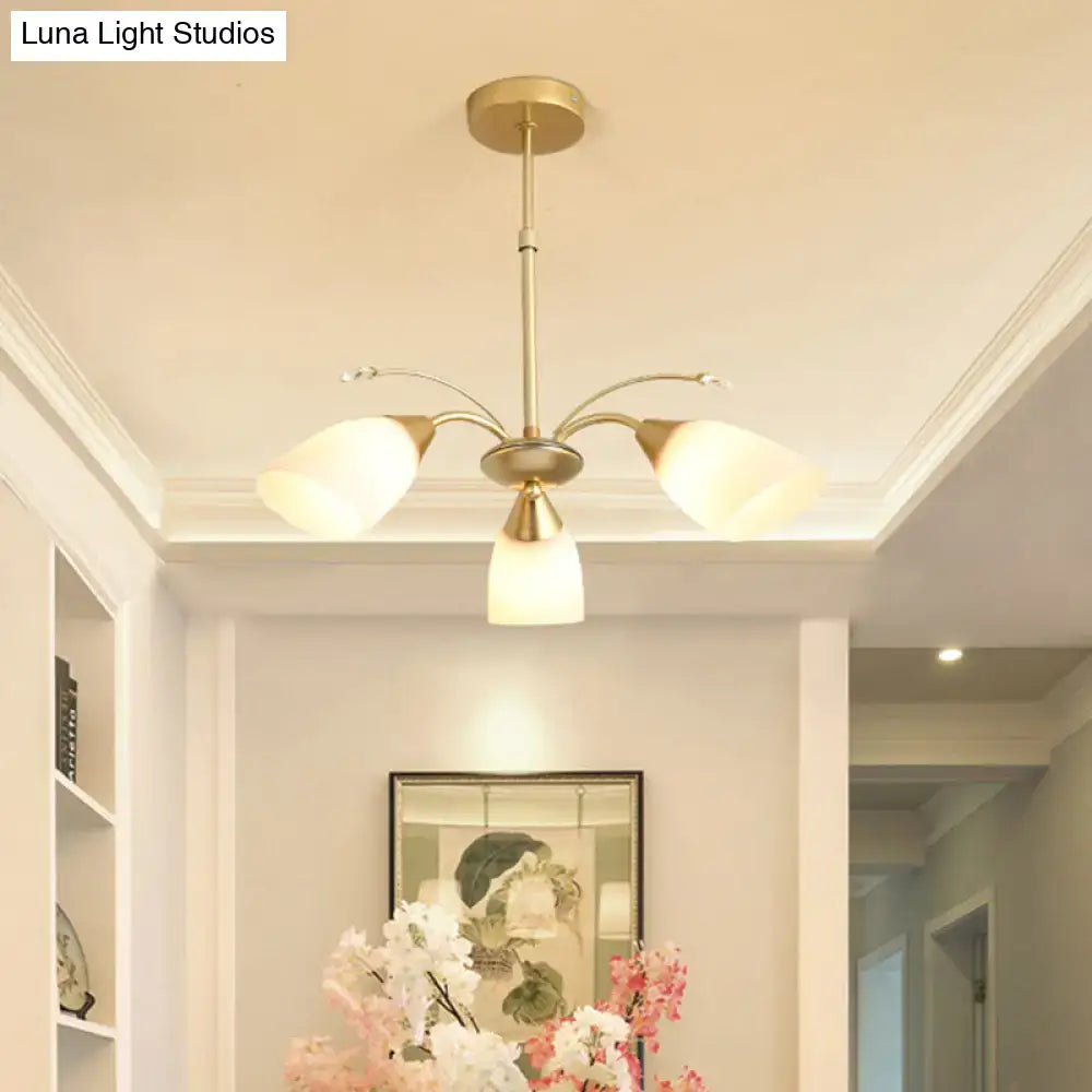 Gold glass chandelier three-arm with frosted shades by Decorbites in brass finish on Tampa Home & Garden Store