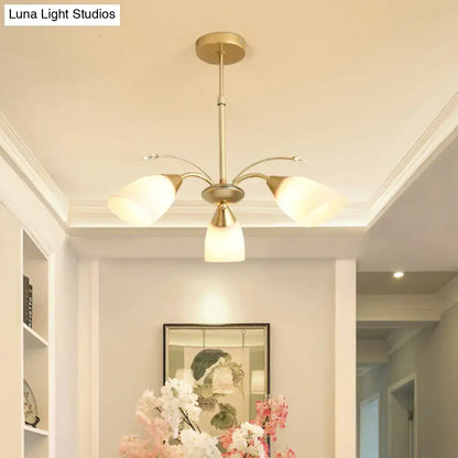 Gold glass chandelier three-arm with frosted shades by Decorbites in brass finish on Tampa Home & Garden Store