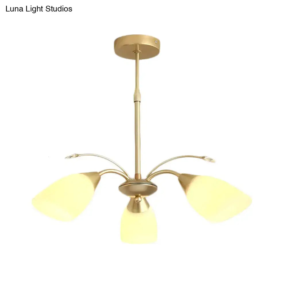 Decorbites gold glass chandelier brass finish with three curved arms and yellow glass shades on Tampa Home & Garden Store
